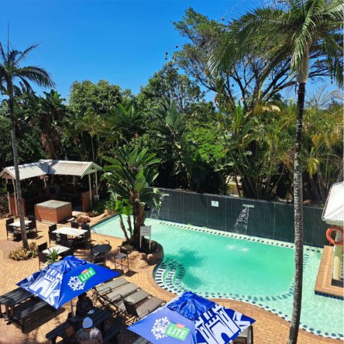Stack of three green cardstock boxes with 3 hole cutouts showing cards inside.