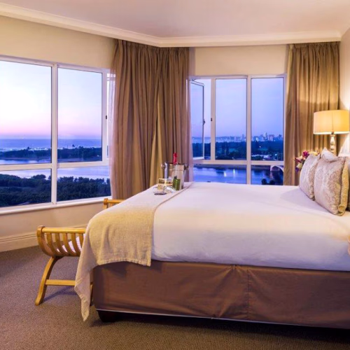 Green cardstock box containing white, beige, and brown cards.